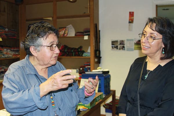 Maryknoll Sister Margaret Sierra (l.) talks with Leona Jewett, a teacher who visited Santa Catalina center. There, she is helping to empower women in Ciudad Juarez
