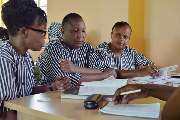Imprisoned women inmates who are trained as paralegals to assist themselves and other prisoners with their criminal cases discuss strategy at a legal clinic in the Lang’ata Women’s Prison in Nairobi, Kenya.