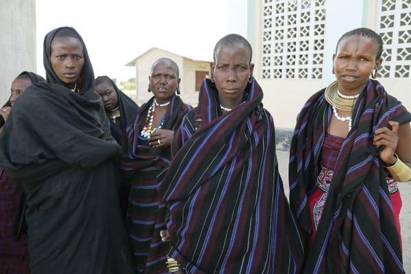 Watatulu women gather at the church compound in Bukundi seeking food assistance.