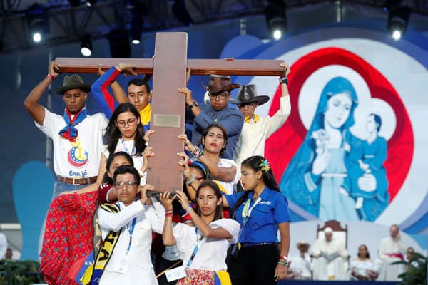 World Youth Day, 2019: Pilgrims carry the World Youth Day cross as Pope Francis joins them in the Way of the Cross at Santa Maria la Antigua Field in Panama City Jan. 25, 2019. (CNS photo/Carlos Jasso, Reuters)