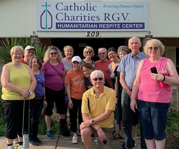 Father Robert Wynne and other volunteers dedicated their time helping refugees at a Humanitarian Respite Center in Texas.(Photo Courtesy Robert Wynne, M.M.)