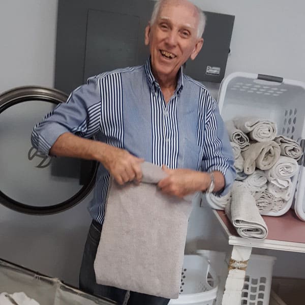 Father Robert Wynne volunteered to help migrants and refugees at a respite center by the U.S.-Mexico border. (Photo Courtesy Robert Wynne, M.M.)
