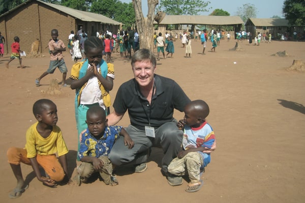 Missioner from Stevens Point, Wis., hopes life will be better for children like these in Yambio because of qualified teachers he is helping to train at Solidarity Teacher Training College. (Courtesy of G. Hurrish/S. Sudan)