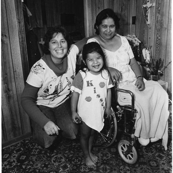 In an older photo, Yvonne Dilling, left, poses with Maria, a refugee from Guatemala, who fell off a train and lost both of her feet. Today, Dilling helps form missionary disciples as a member of the Maryknoll Hispanic Outreach Team in Texas. (D. Dunleavy/U.S.)