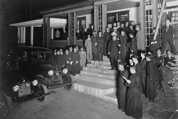 Father Price (center, standing on steps) leaves Maryknoll to lead the first group of Maryknoll missioners to share the Gospel in China in 1918. (Maryknoll Mission Archives)