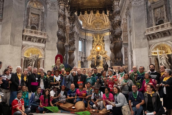 People are pictured during a prayer service at the start of the first session Synod of Bishops for the Amazon at the Vatican Oct. 7, 2019. Discussions at the Amazon Synod have enlarged to include the theology of creation, "where the Word of God resides." (CNS/Vatican Media)