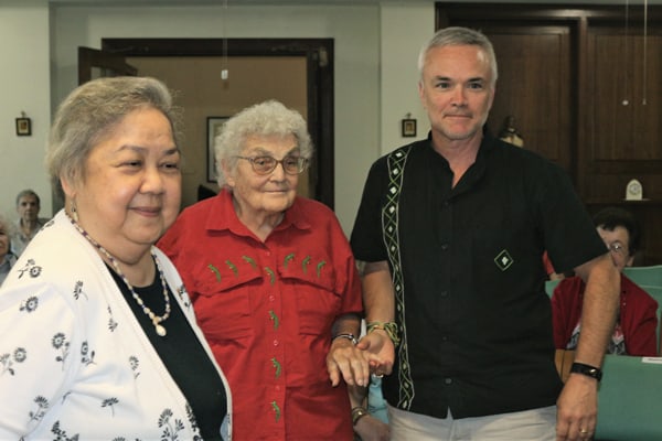 Maryknoll Sisters Vice President Norie Mojado (l.) congratulates Sister Marion Puszcz and Affiliate Richard Lessard on becoming prayer partners for Bangladesh. (S. King/U.S.)