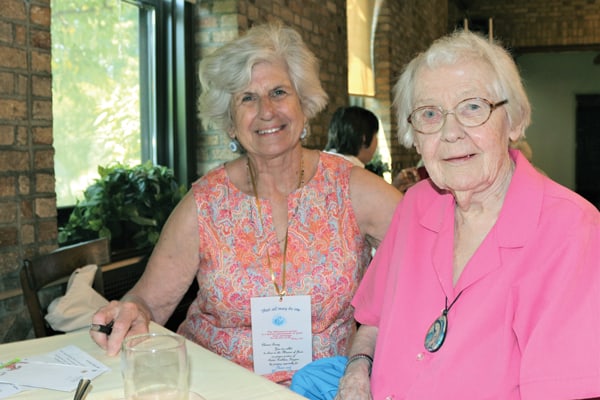 Maryknoll Affiliate Eleanor Tunny (l.) and Maryknoll Sister Kathleen Higgins get to know each other before becoming prayer partners at a commissioning ceremony at the Maryknoll Sisters center. (S. King/U.S.)