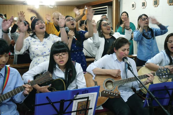 A choir, formed by immigrants in Japan, sings at the Infant Jesus Church in the city of Iga-Ueno, where Father Rodriguez serves as pastor. (P. Saunders/Japan)