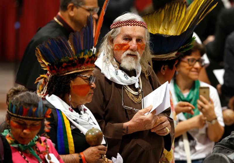 People participate in a prayer service in St. Peter's Basilica at the start of the first session of the Synod of Bishops for the Amazon at the Vatican in October 2019. (CNS photo/Paul Haring)