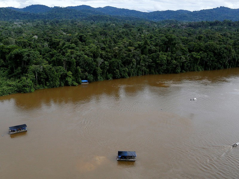 Querida Amazonia: A gold dredge is seen at the banks of Uraricoera River during Brazil's environmental agency operation against illegal gold mining on indigenous land, in the heart of the Amazon rainforest, April 15, 2016. (CNS photo/Bruno Kelly, Reuters)