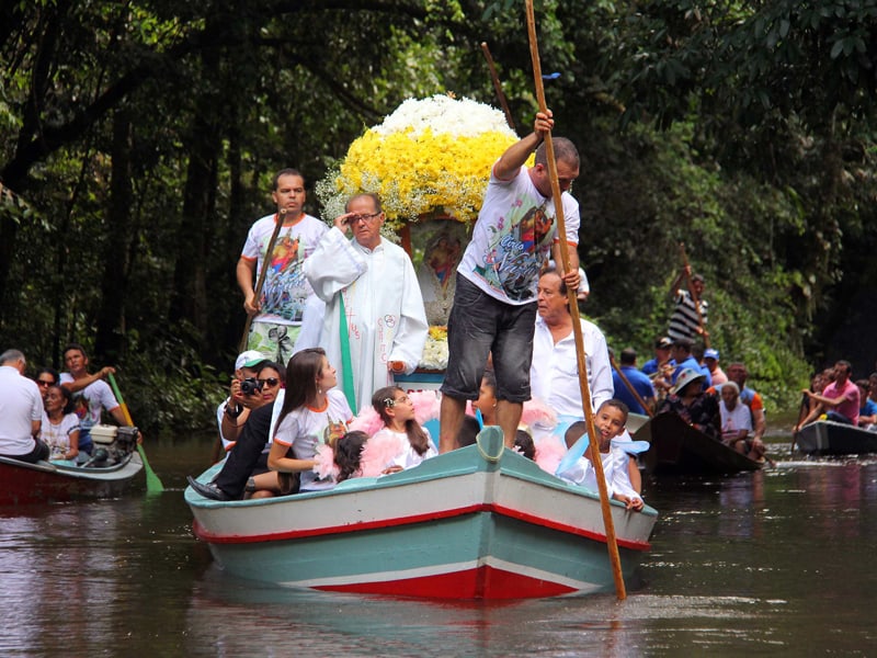 Querida Amazonia: Pilgrims travel in boats as they accompany the statue of Our Lady of Nazareth during an annual river procession and pilgrimage along the Apeu River to a chapel in Macapazinho, Brazil, Aug. 3, 2014. The Vatican released Pope Francis' postsynodal apostolic exhortation, "Querida Amazonia" (Beloved Amazonia), Feb. 12, 2020. (CNS photo/Ney Marcondes, Reuters)