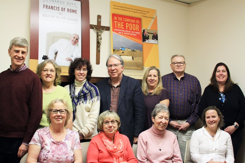 The Orbis Books staff: (standing, l. to r.) Paul McMahon, Meryl Marcus, Bernadette Price, Robert Ellsberg (publisher), Maria Angelini, Michael Lawrence, Kelly Ceely, and (seated) Nancy Keels, Linda Mulvaney, Doris Goodnough and Jill O’Brien (Kimberly Asencio/U.S.)