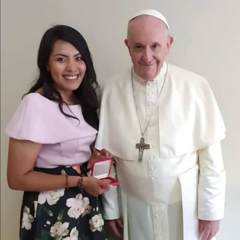Brenda Noriega poses with Pope Francis for a photo at World Youth Day in Panama, 2019. (Photo provided by Brenda Noriega/Panama)