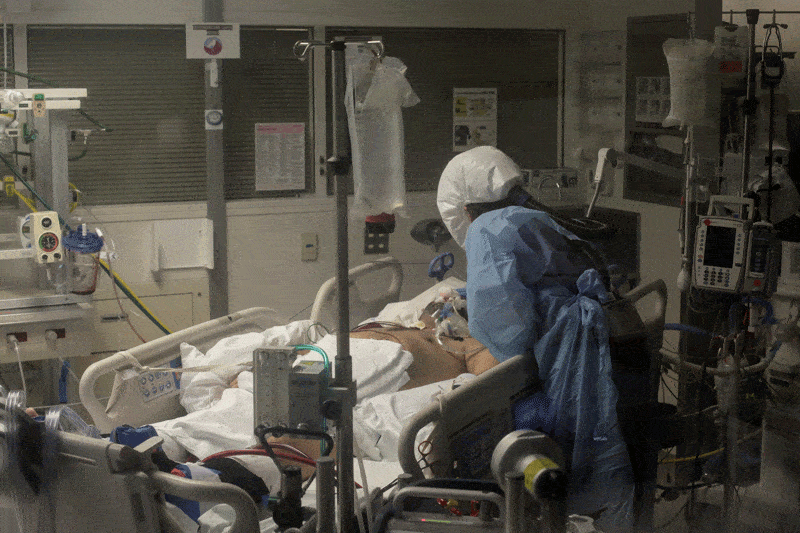 Nurse Leah Silver cares for a patient sick with the coronavirus in the COVID-19 ICU at the University of Washington Medical Center-Montlake in Seattle April 24, 2020. (CNS photo/David Ryder, Reuters)