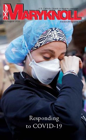 The cover of the July/August 2020 issue of Maryknoll magazine features the photo of a nurse in New York City wipes away tears in April 2020 during the coronavirus pandemic. This edition of Maryknoll magazine is available as a digital edition, online or as a downloadable pdf. (CNS/Mike Segar, Reuters)