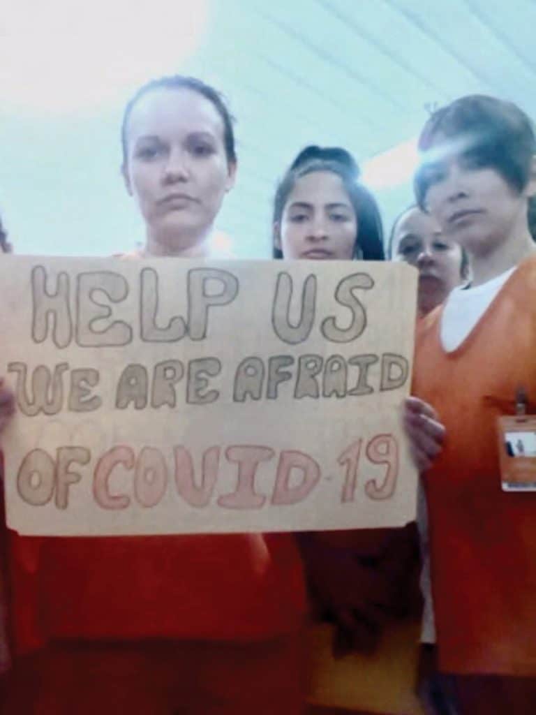 Detained migrants face COVID-19 risk: Migrants detained in an Immigration and Customs Enforcement facility in Basile, La., show signs related to the coronavirus disease in early April. (CNS, Handout via Reuters/U.S.)
